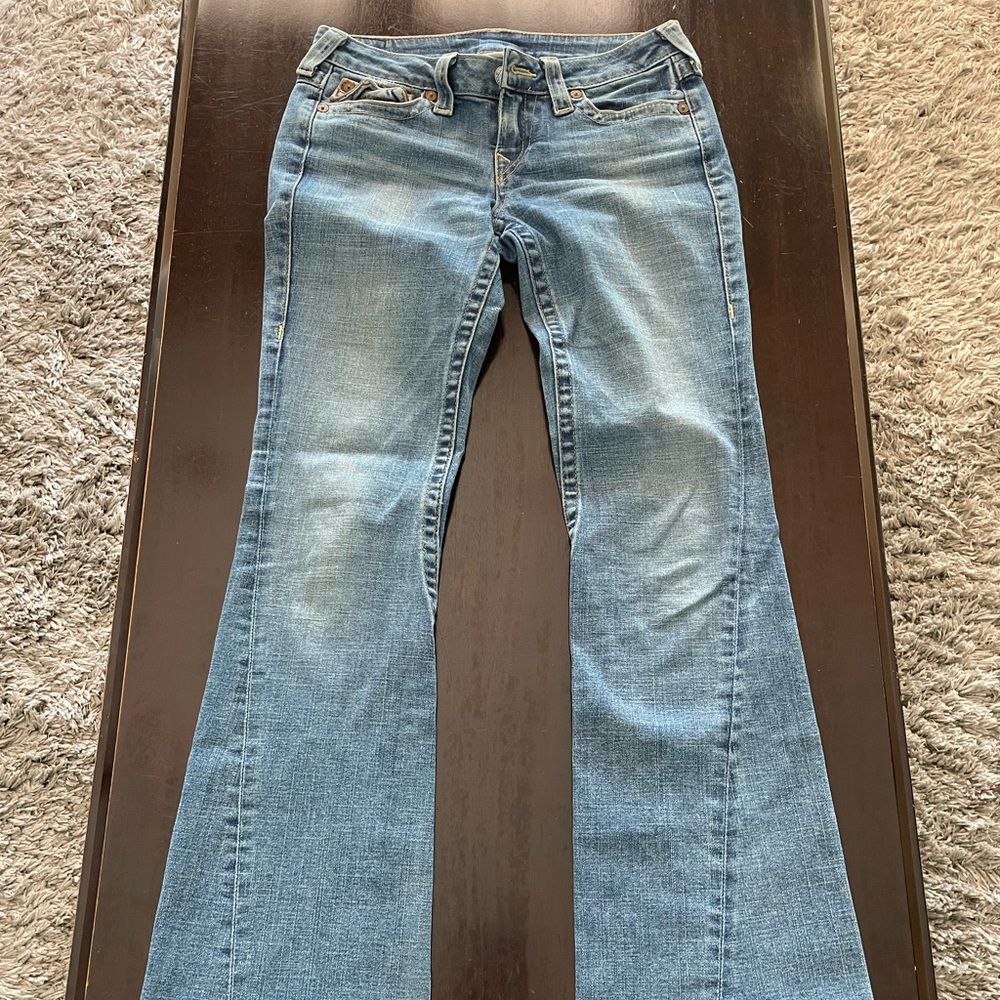 True religion jeans with leather pockets and wide legs